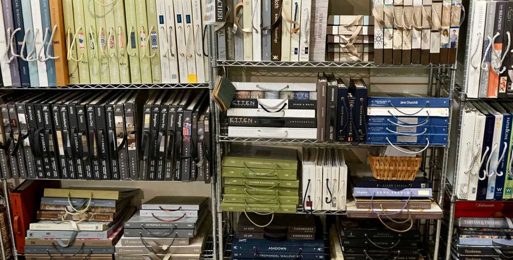 wall of fabric sample books