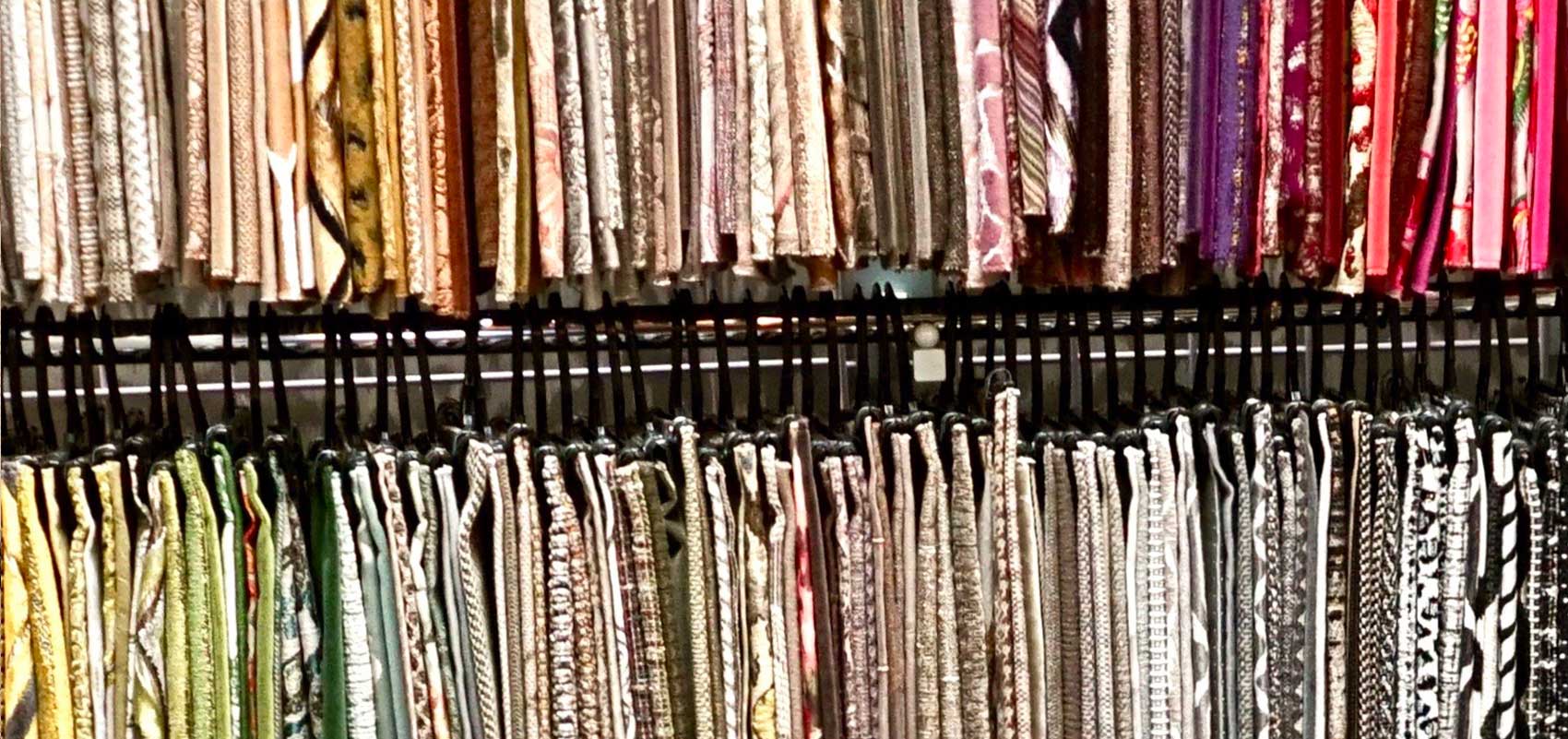 racks of fabric samples in showroom